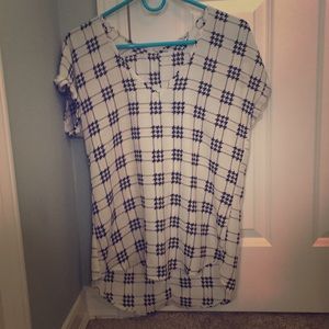 Cream with black and pink highlighted blouse.